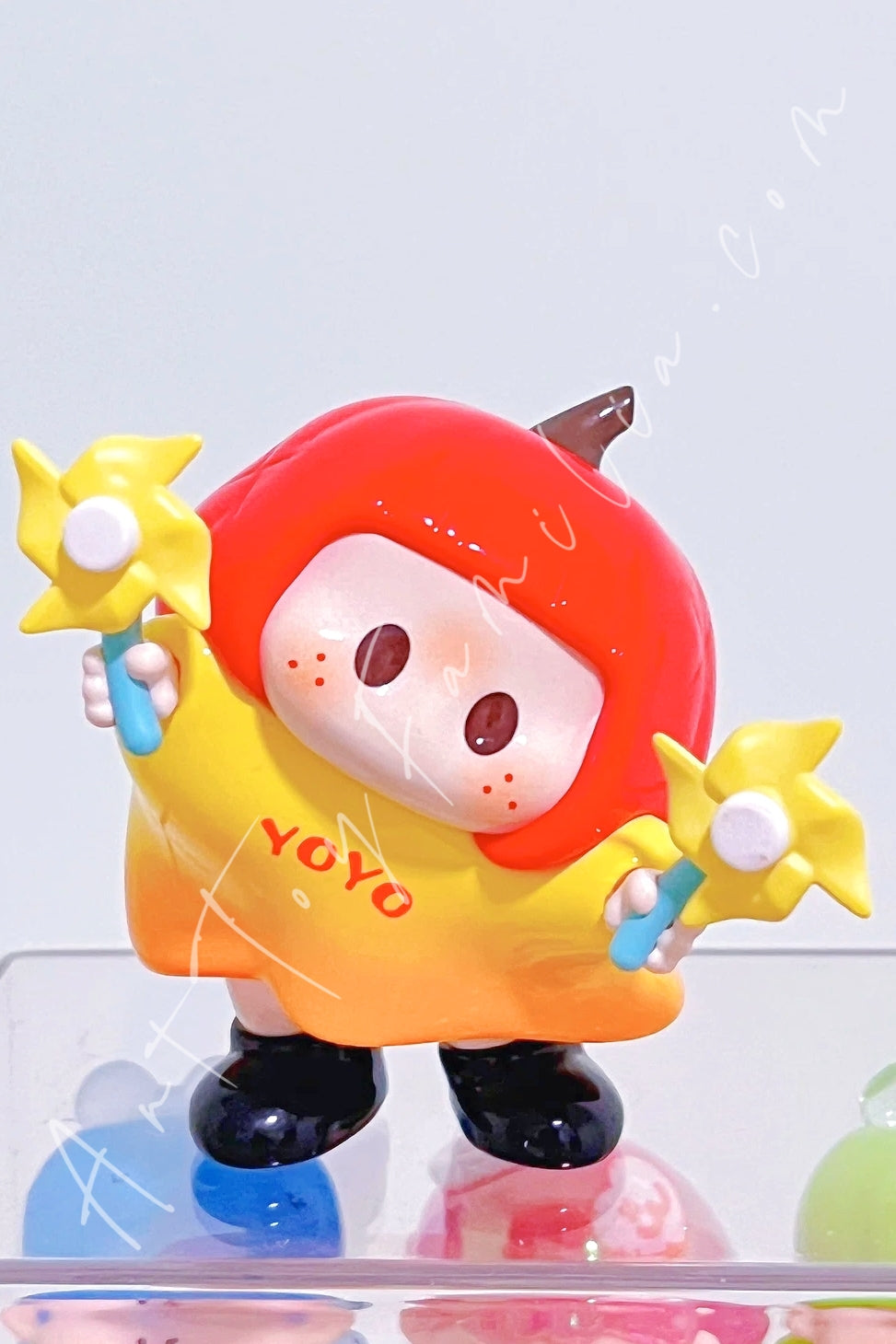Miniso Yoyo Tilted Head Series Orange Glow Spin
