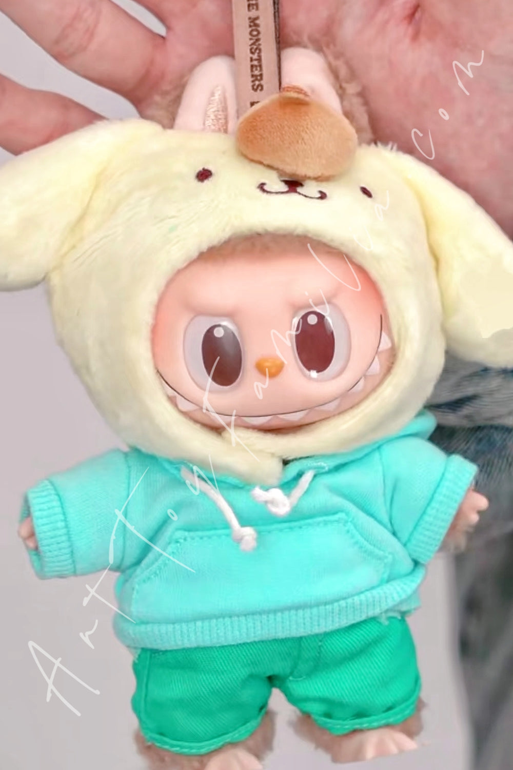 Popmart The Monsters × Hello Kitty and Friends Series Vinyl Plush Pendant Pompompurin